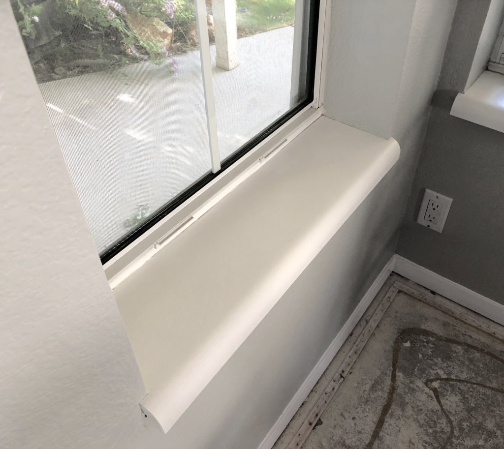 refinished white painted window sills 