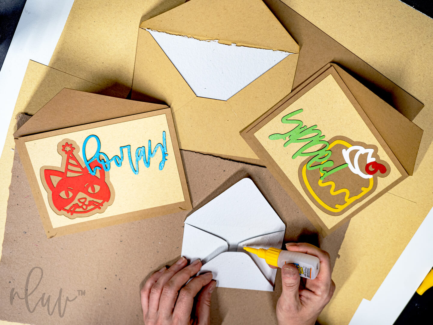 Glue handmade paper envelopes