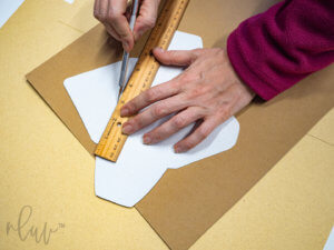 scoring a handmade envelope for easy folding